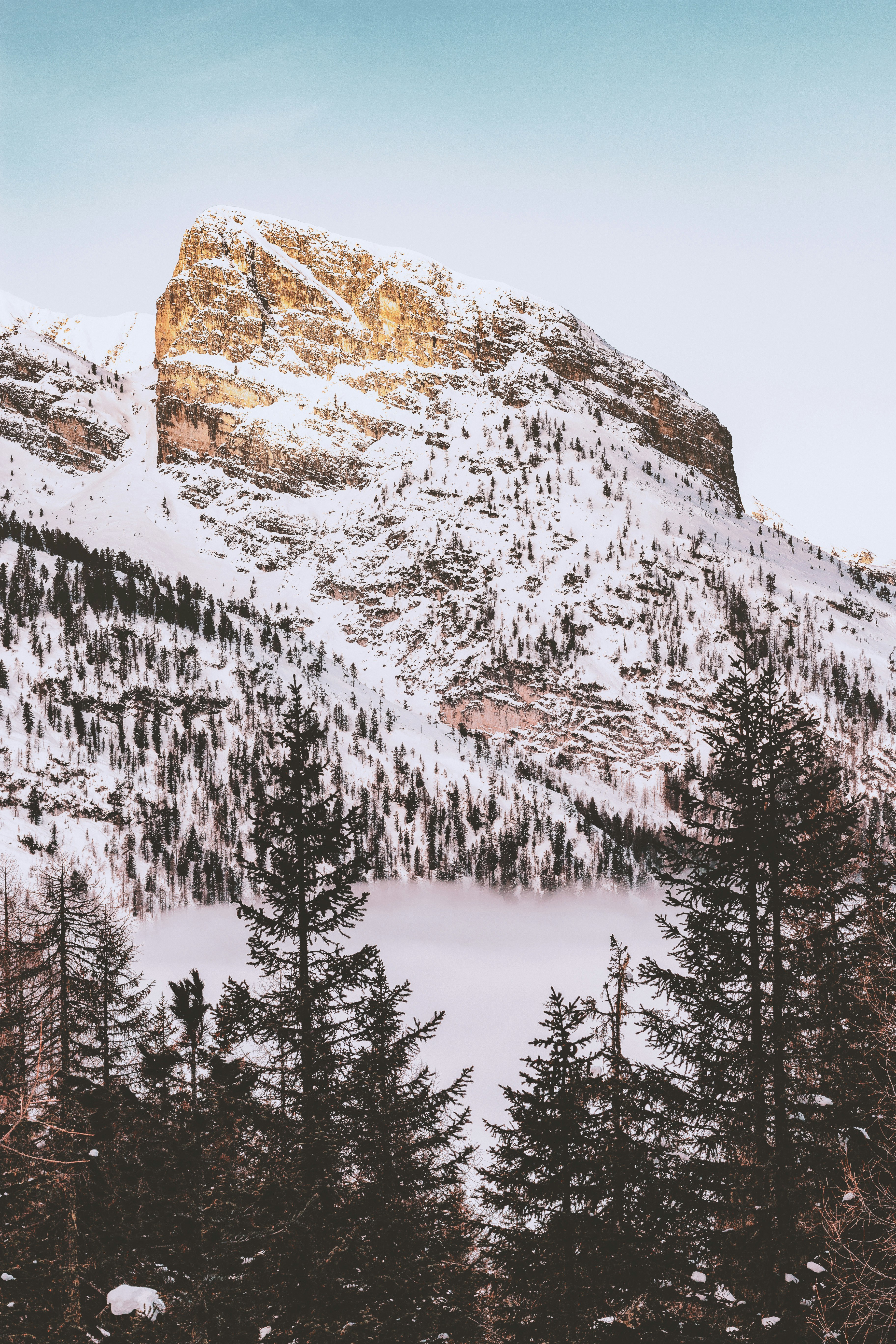 landscape photography of mountain coated snow